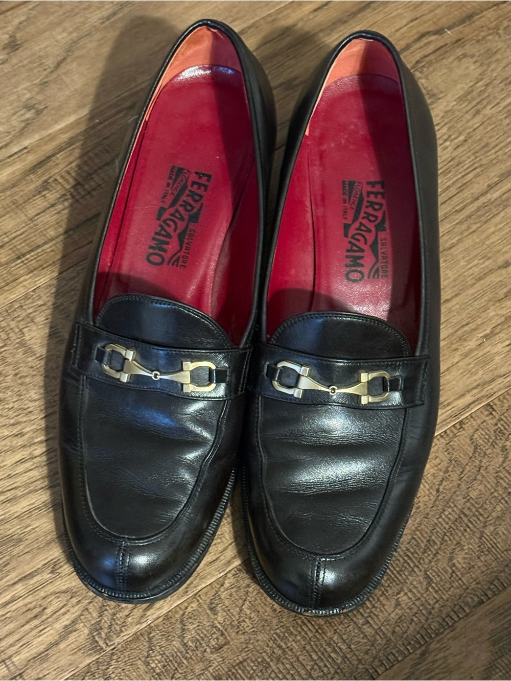 Salvatore Ferragamo Black Leather Loafers with Red Interior and Gold Bit